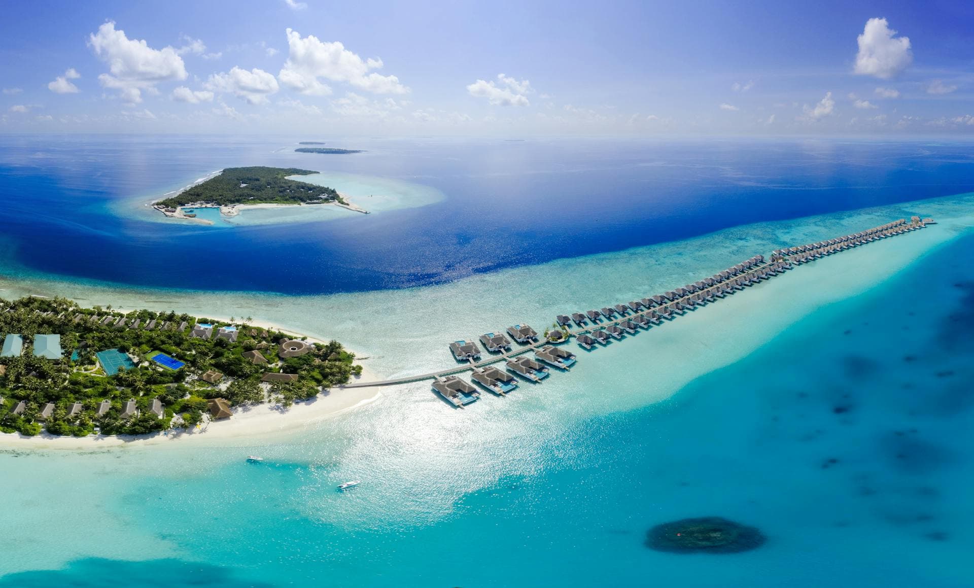 Overwater villas off an island in the Maldives