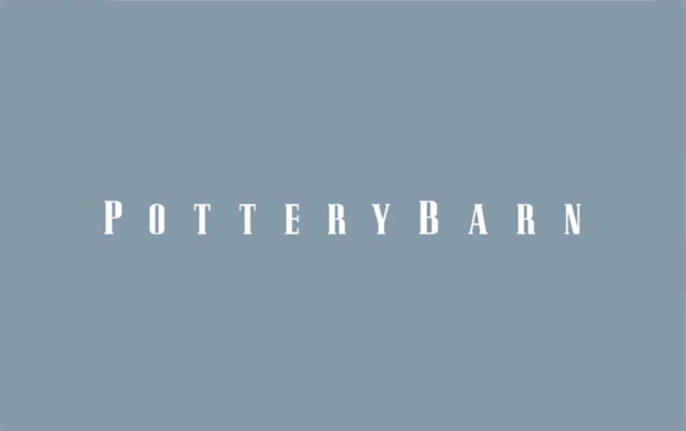 Pottery Barn logo with white text on a solid muted blue-gray background.