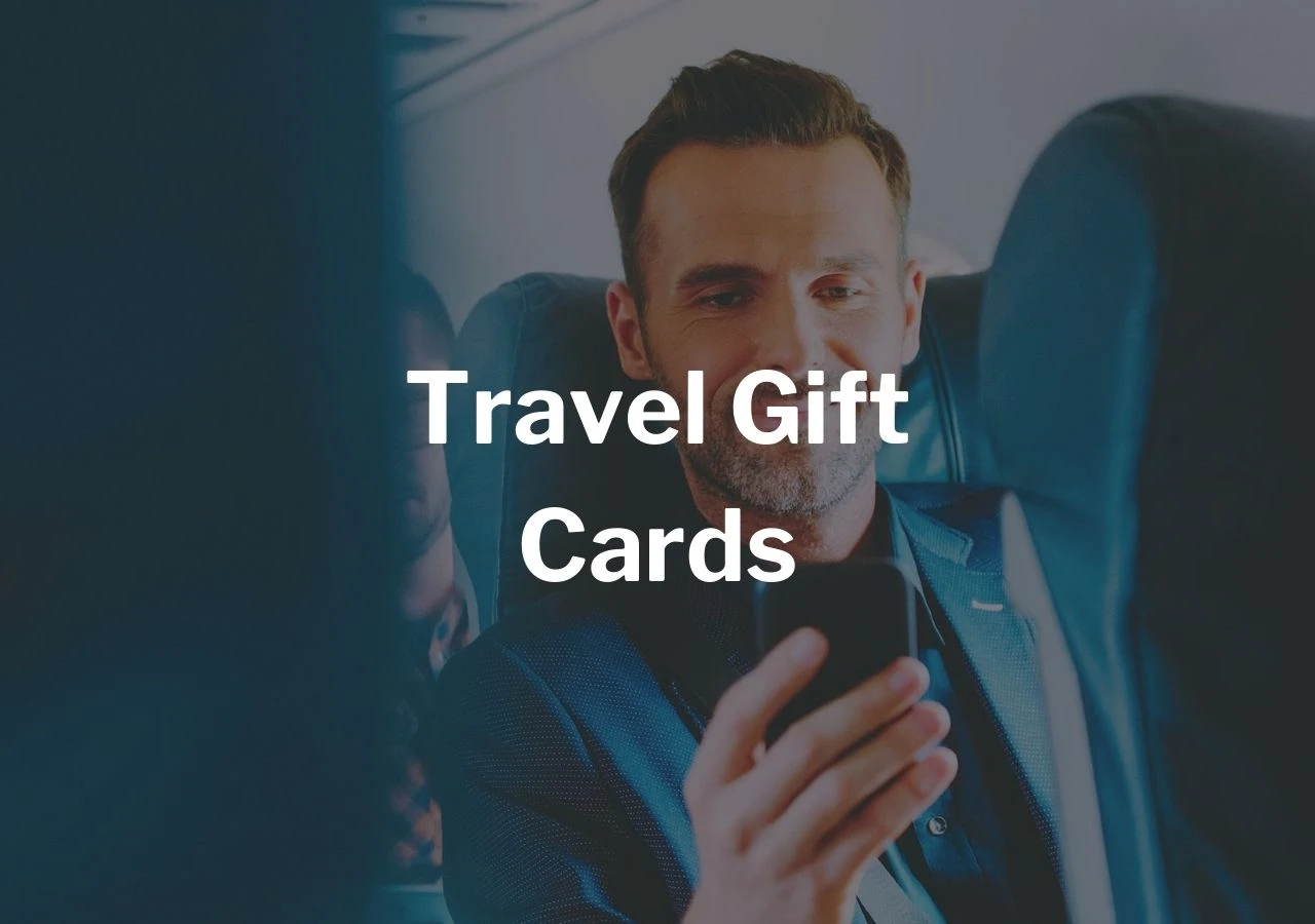 Man in a suit sitting on a plane, looking at his phone, with text Travel Gift Cards overlaid.