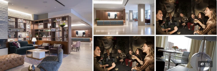 The hotel lobby buzzes with a vibrant group of people socializing. This hotel blends sustainability with modern comforts